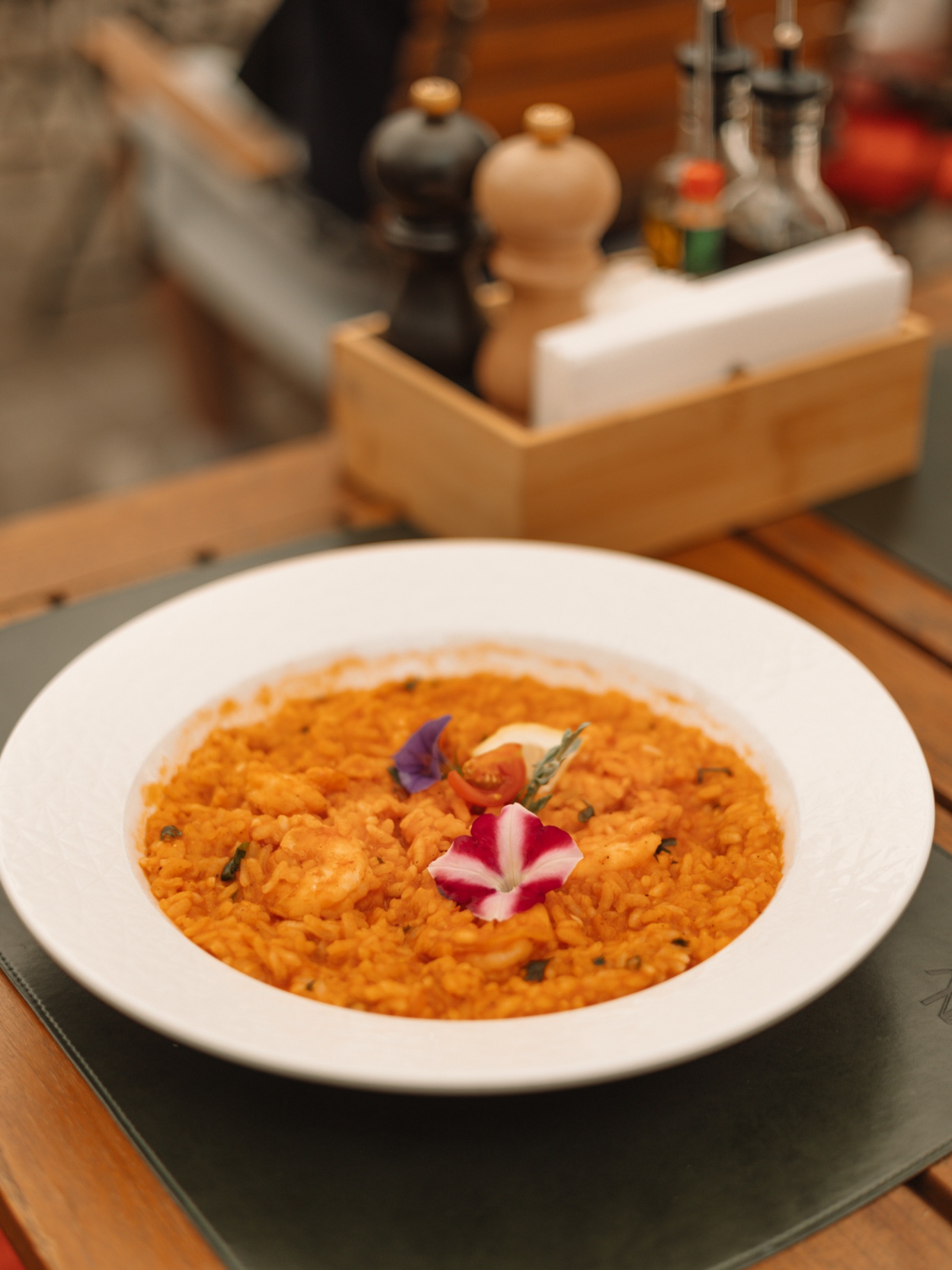 Shrimp risotto with edible flower